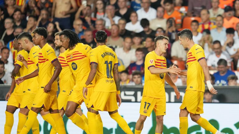 Barcelona player ratings vs Valencia: Robert Lewandowski is deadly! Striker nets brace and 17-year-old Pau Cubarsi impresses in 2-1 win as Hansi Flick gets up and running in La Liga