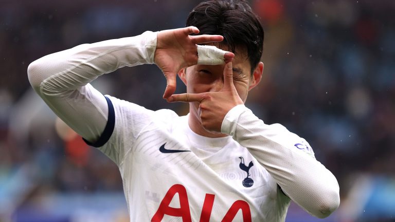 Son Heung-min the K-Pop star?! Tottenham hero joins up with girl group NewJeans as superstars hold up their own Spurs jerseys during South Korea tour