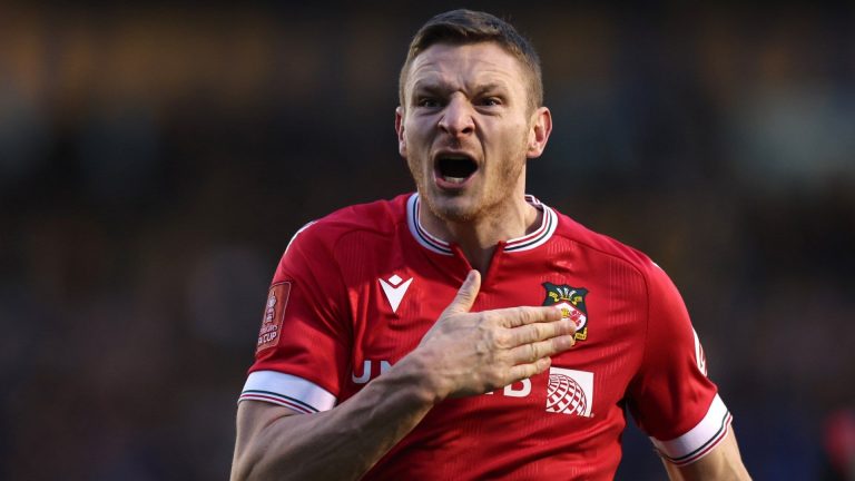 VIDEO: Paul 'Welshpool' Mullin! Wrexham star whips out Ryan Reynolds-inspired Deadpool mask as he celebrates scoring on return to starting XI against Salford City