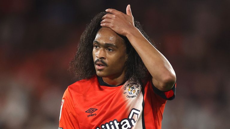 Former Manchester United ace Tahith Chong collapses on pitch during Luton's clash with Wayne Rooney's Plymouth in terrifying scenes