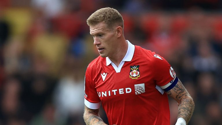 VIDEO: Wrexham star James McClean riles angry Birmingham fans with gesture after having beer hurled at him during feisty 'Hollywood derby'