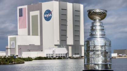 Stanley Cup visits Hubble Telescope mockup at Kennedy Space Center