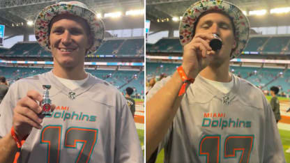 Tkachuk sips out of mini-Stanley Cup at Dolphins game